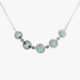 18K White Gold Emerald and Diamond Halo Necklace